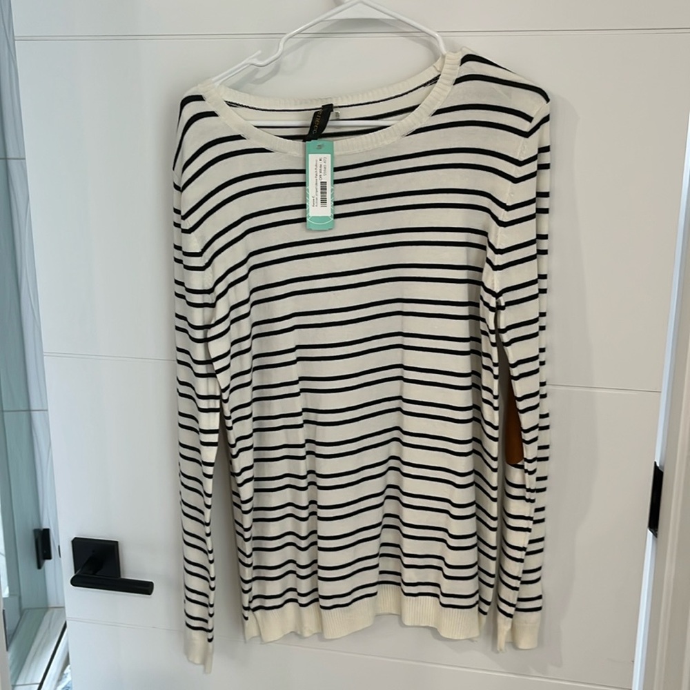 Cute off white long sleeve shirt with brown patches on elbows